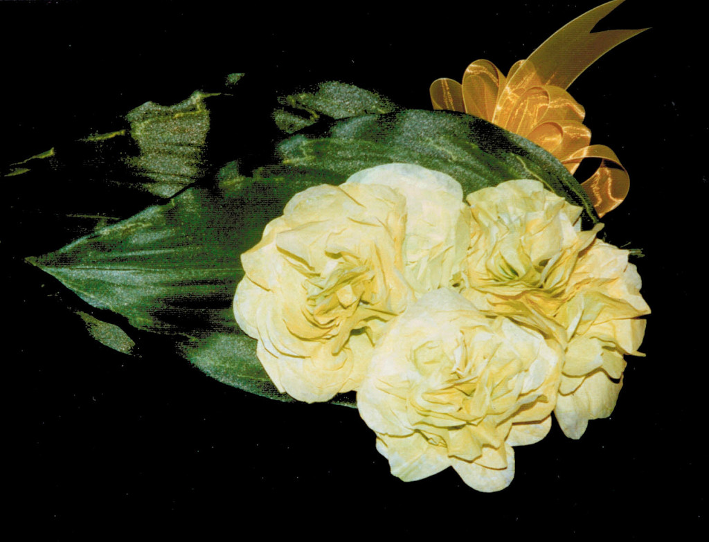 bow with paper flowers, large leaves, organza bow etc.